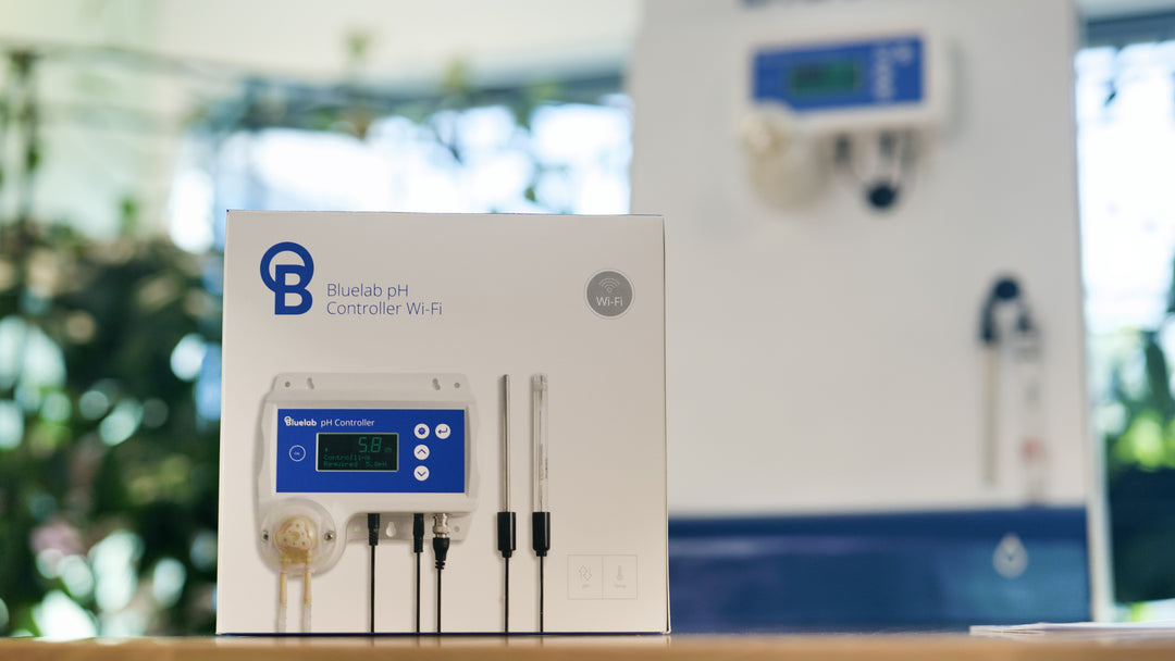 Bluelab pH controller packaging on a table with a blurred background